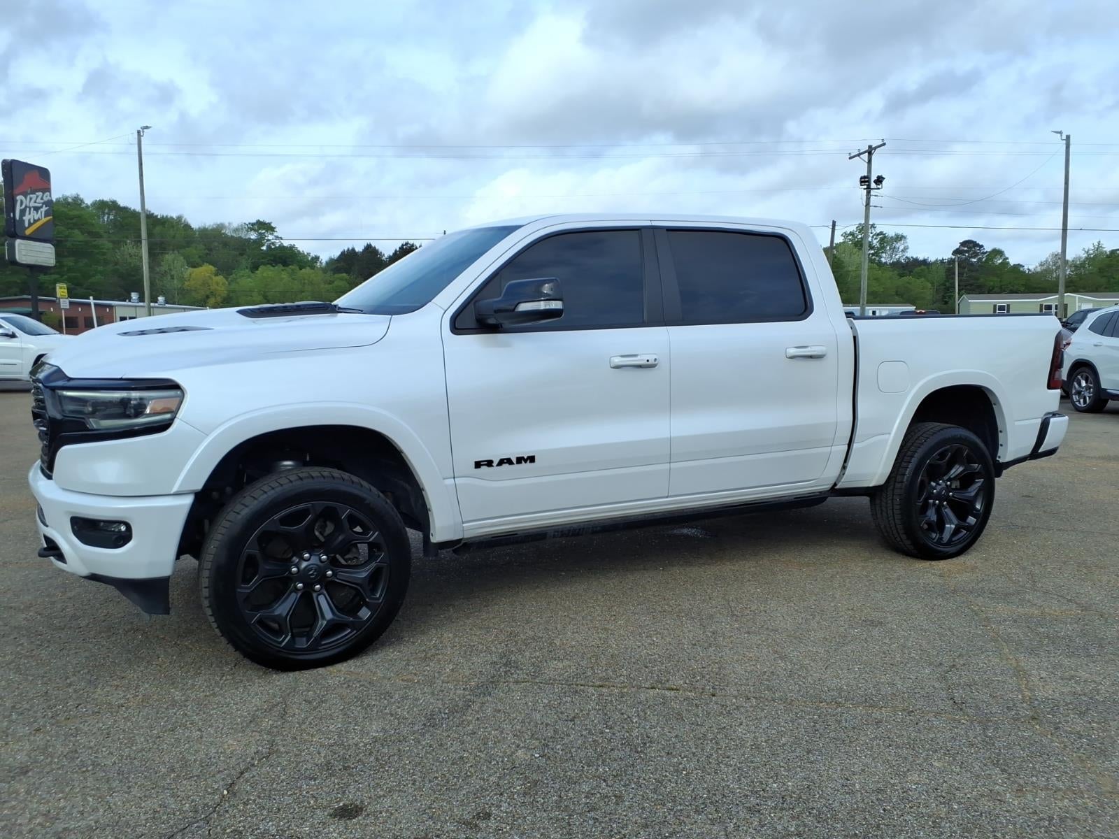 2021 RAM 1500 Limited in White — front three-quarter view