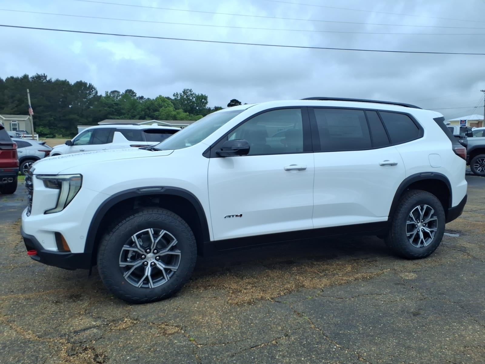 2026 GMC Acadia AT4 in Summit White — front three-quarter view
