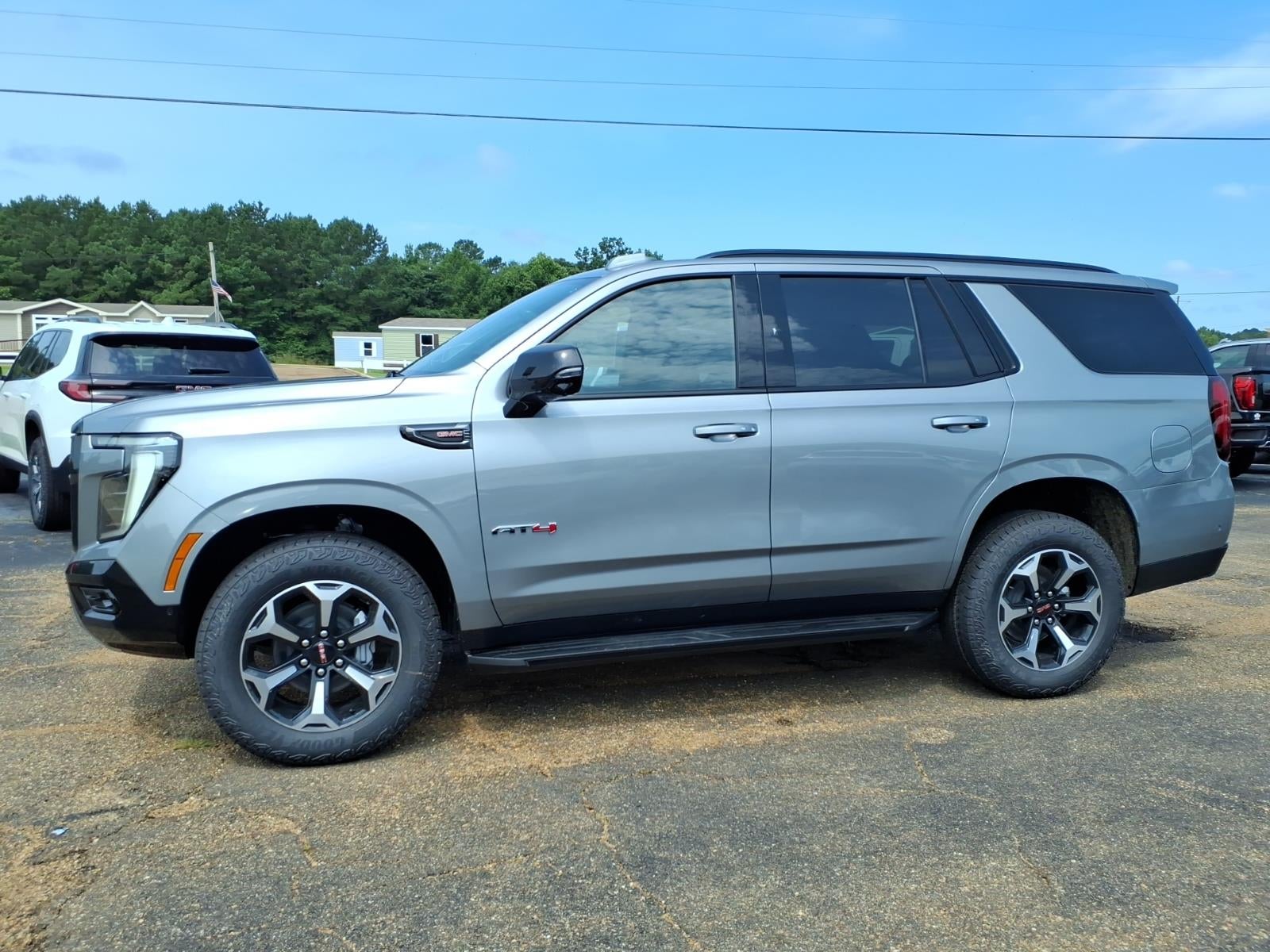 2026 GMC Yukon AT4 in Sterling Metallic — front three-quarter view
