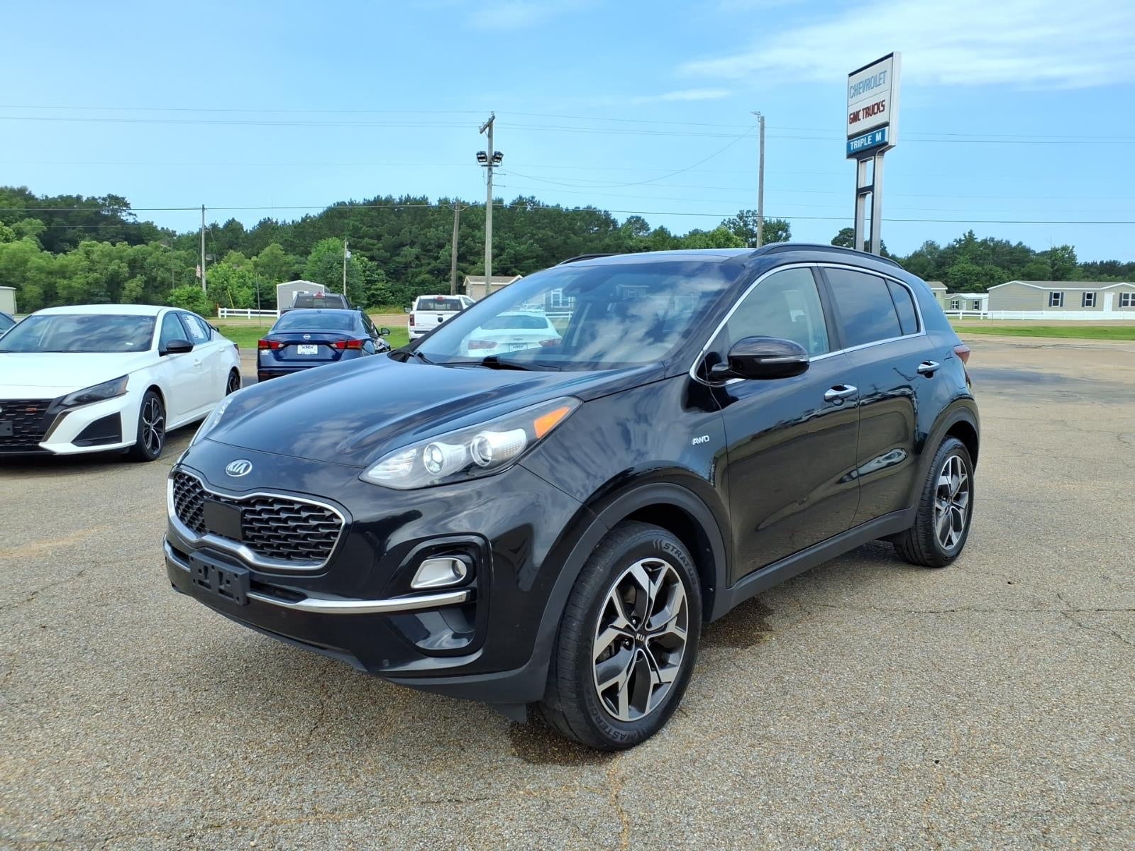 2020 Kia Sportage EX in Black — front three-quarter view